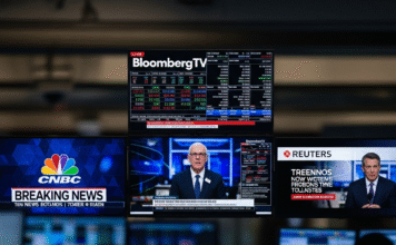 รายงานด่วนจาก Bloomberg, CNBC และ Reuters: ตลาดโลกผันผวนหลัง ‘เฟด’ คงดอกเบี้ย แต่ส่งสัญญาณผ่อนคลาย พร้อมจับตาผลประกอบการ ‘หุ้นเทค’ พุ่งแรง